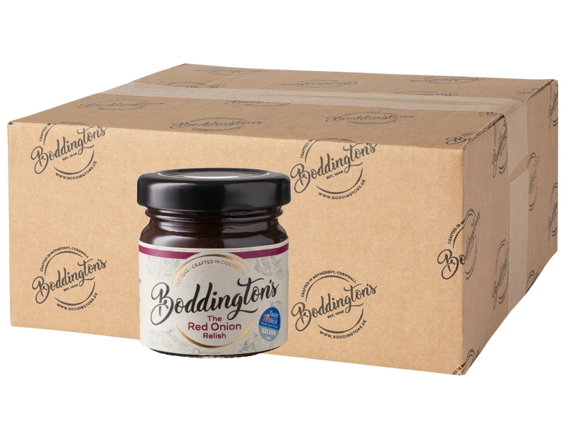 48g Mini Jar of Boddingtons Red Onion Relish with a cardboard box in the background