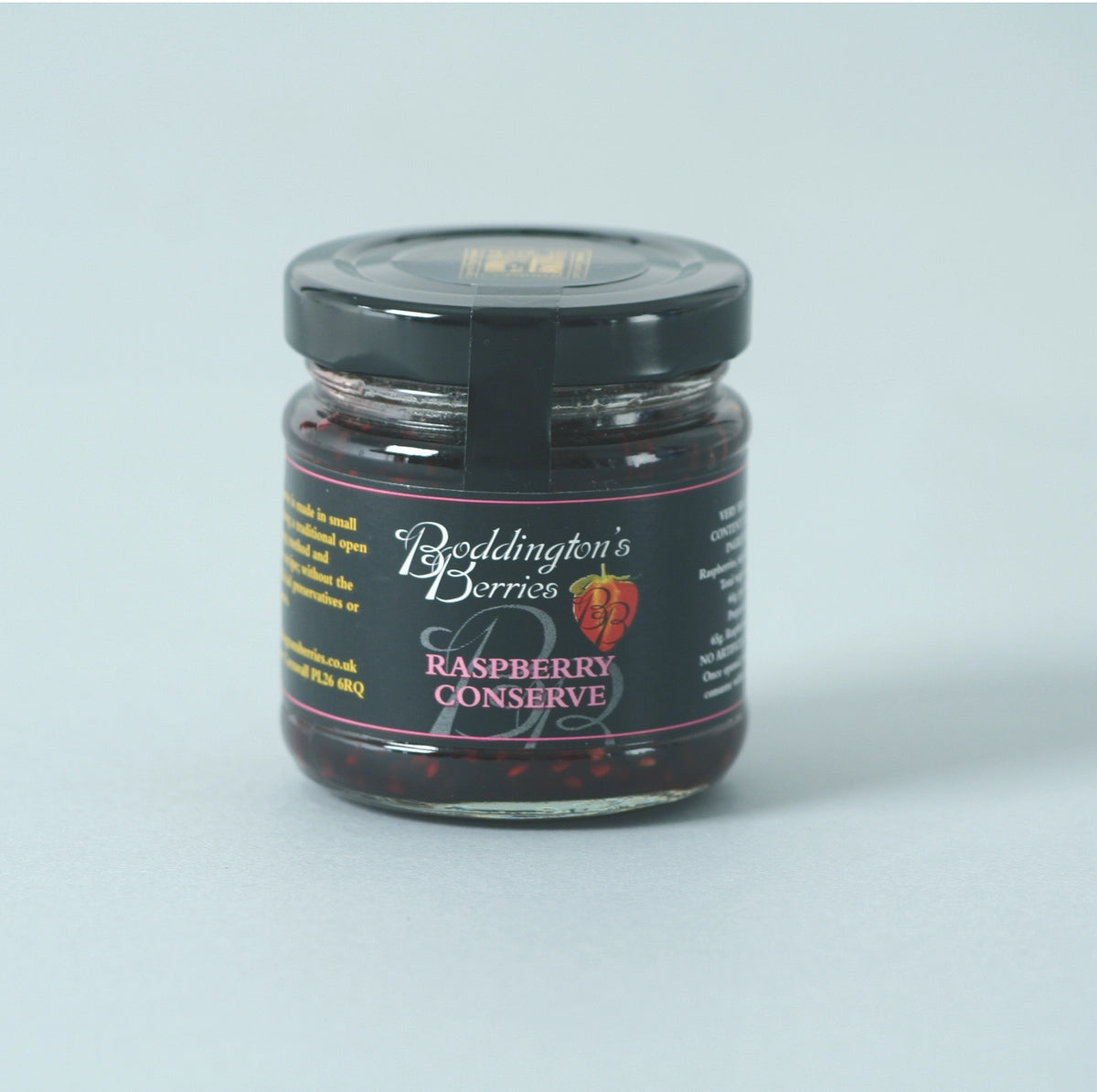 Jar of Boddington's Berries Raspberry Conserve on a light gray background