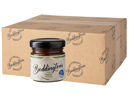 48g Mini Jar of Boddington's Apple Chutney with a cardboard box in the background