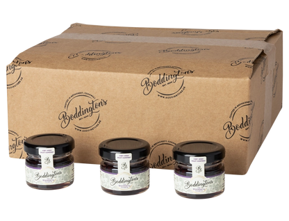 Three jars of Boddington's 28g individual jars of Blackberry Conserve with a cardboard box behind