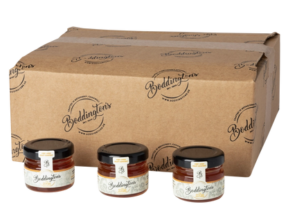 Three jars of Boddington's 28g individual jars of Orange Marmalade with a cardboard box behind