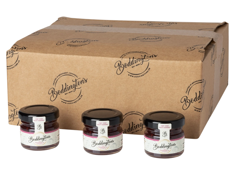 Three jars of Boddington's 28g individual jars of Raspberry Conserve with a cardboard box behind
