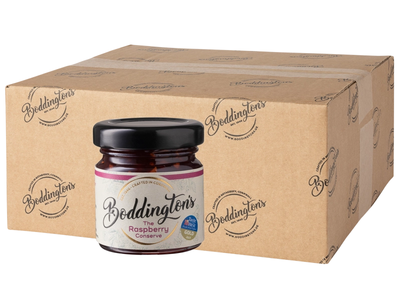 48g Mini Jar Boddington's Raspberry conserve with a cardboard box in the background