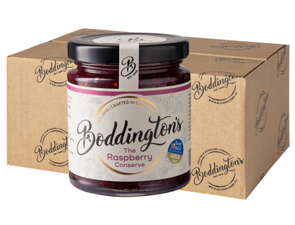 227g Jar of Boddington's Raspberry Conserve jar with packaging in the background